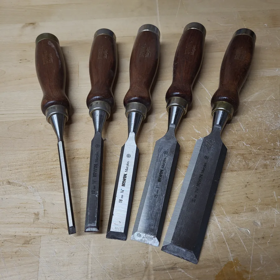 Category example: five woodworking chisels arranged together.