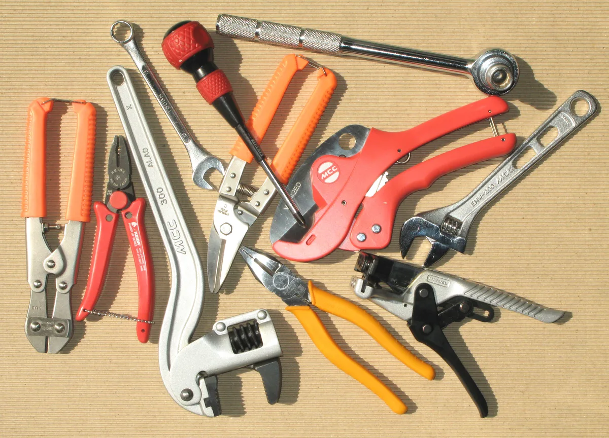 An array of cutters, wrenches, pliers, screwdrivers and wire strippers.