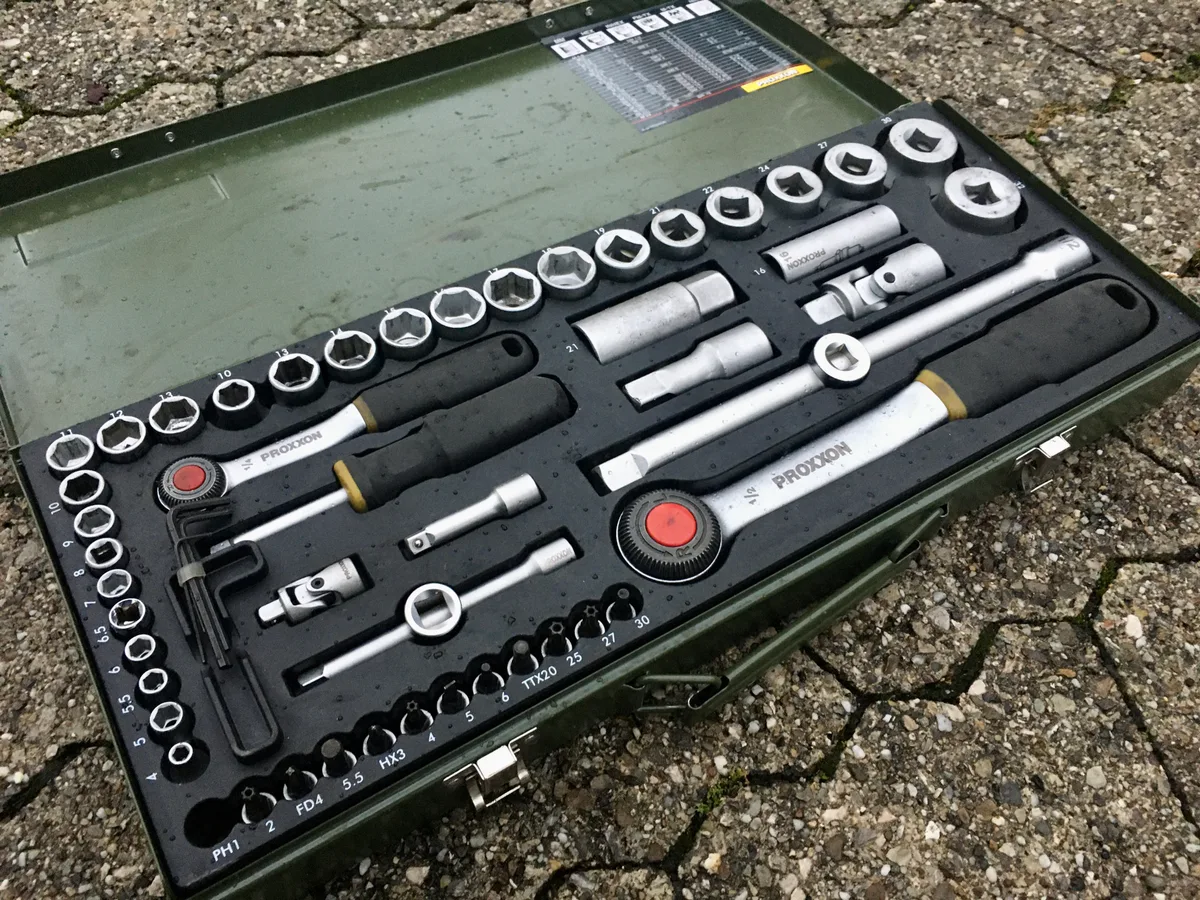 Category example: two ratchets and multiple sockets organized in a metal case.